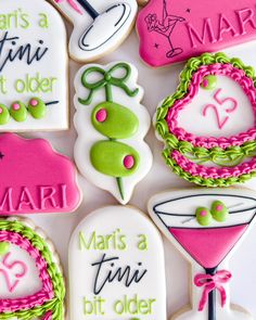 decorated cookies are arranged in the shape of martinis and cocktail glasses with names on them