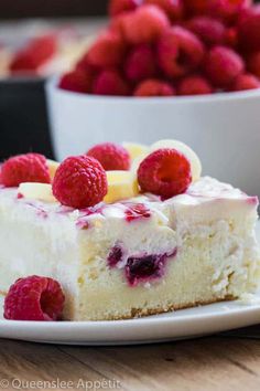 a piece of cheesecake with raspberries on top