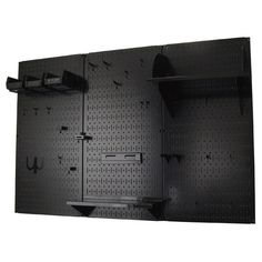 the pegboard is black and has shelves on each side with hooks for hanging items