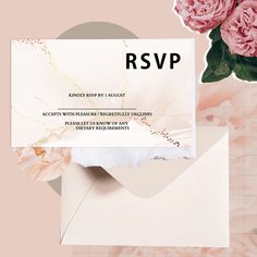 an envelope with pink flowers on it next to a card that says rsvp