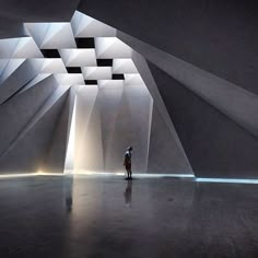 a person standing in front of a white structure with light coming from it's windows