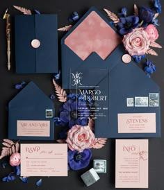 the wedding stationery was done in navy blue and pink, with an assortment of flowers