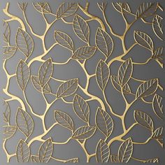 an intricately designed metal wall panel with gold leaves