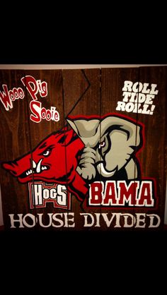 a wooden sign with the words hogs, house divided and an elephant on it