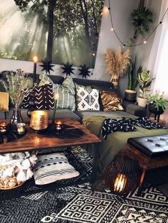 a living room filled with lots of furniture and decor on top of carpeted flooring