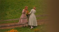 two women standing next to each other in front of a wooden fence with the words i can't believe today is my wedding day