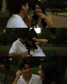 two people sitting on a park bench and one is listening to music while the other holds an umbrella