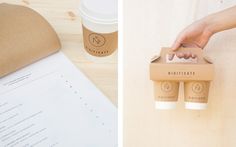 a person holding a coffee cup in front of a paper and a cardboard box with two cups on it