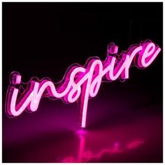 a pink neon sign that says inspire in the middle of it's frame, against a black background