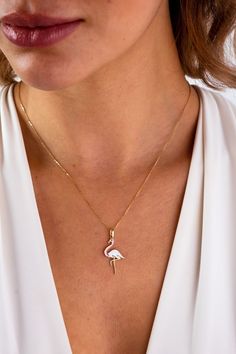 This 14K gold flamingo necklace is a charming and dainty piece of jewelry that is perfect for any animal lover. The pendant features a cute flamingo design that is sure to add a touch of whimsy to any outfit. This minimalist necklace is versatile enough to be dressed up or down and can be worn every day.. It makes for a lovely gift for any occasion, including Christmas, Father's Day, Mother's Day, Valentine's Day, an anniversary, or a birthday. It is a great present for the special woman in your Flamingo Pendant, Flamingo Necklace, Cute Flamingo, Flamingo Design, Gold Anklet, Gold Armband, Bird Charm, Necklace Minimalist, String Bracelet