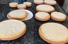 several round cakes cooling on a rack