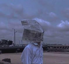 a man with a paper bag on his head