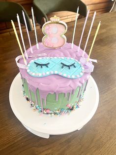 a birthday cake with candles on top of it