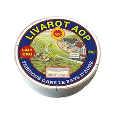 a tin with an image of a town on the side and words livvarot aob