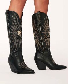 Constance by Billini is a long statement cowboy boot. Step out in style with this high-impact embroidered western boot. Featuring; mid stacked block heel closed pointed toe structured upper statement western inspired embroidery side pull tabs synthetic upper, lining and outsole Available in Black-Gold Metallic and Gold Metallic. Heel height 8cm. Active Tights, Black Cowboy Boots, Star Boots, Black Cowboy, Western Boot, Cowboy Boot, Sandals Brands, Black Star, Black Metallic