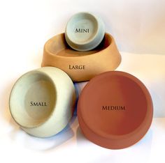 three bowls labeled with small, large and medium sizes