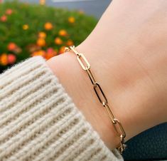 Lend interest to your attire with this Paperclip Chain Bracelet. Crafted in 14K Gold, this 7.25 inch length bracelet of the hollow oval-link chain is a great anytime choice. Buffed to a brilliant luster, this bracelet secures with a lobster clasp. Wear it every day - whenever, wherever. Metal: 14K Gold (Stamped) Closure of Bracelet: Lobster Clasp Bracelet Length: 7.25 inches Bangle Collection, Miraculous Medal Necklace, Hand Jewelry Rings, Bridal Diamond Necklace, Paperclip Bracelet, Anklet Designs, Simple Hoop Earrings, Clasp Bracelet, Enamel Necklaces