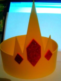 a paper crown sitting on top of a table