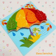 an image of a colorful card with leaves on it