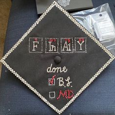 a black graduation cap with the words friday written in red and white letters on it