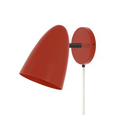 a red lamp on a white background