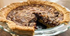 a pie sitting on top of a wooden table