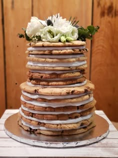 a cake made out of cookies with flowers on top