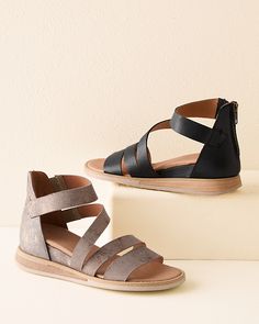 Our sleek and sporty wedge sandals are ready to go anywhere, and look especially good when paired with a linen skirt or athleisure pants. We gave them an edgy back zip and elastic gussets for ease, and crafted them in Spanish leather or suede. Exclusive. Back zip. Open round toe. Leather-wrapped footbed. Man-made sole. Spain. Black Leather Sport Sandals With Adjustable Strap, Casual T-strap Sandals With Leather Sole And Round Toe, Black Open Toe Sport Sandals With Textured Sole, Comfortable Leather T-strap Open Toe Sandals, Black Leather Sport Sandals With Buckle Closure, Bronze Sandals, Cork Sandals, Comfy Sandals, Trendy Sandals