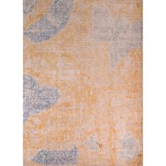 an orange, blue and yellow rug with abstract designs on it's edges is shown