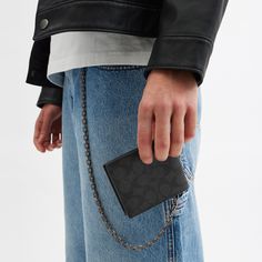 A biker-inspired style with a rebellious attitude our Signature canvas and refined leather Billfold Wallet With Chain combines form function and craftsmanship. Use the organized design on its own or attach the chain strap and clip it to a belt loop jacket or inside a bag. | Coach Billfold Wallet With Chain In Signature Canvas - Charcoal Signature Wallet With Chain, Leather Billfold, Hobo Crossbody Bag, Branding Coach, Billfold Wallet, Backpack Charm, Coach Men, Bag Coach, Coach Wallet