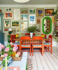 the dining room is decorated in bright colors