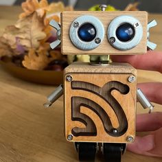 "Student cute gift - handmade wooden robot , sculpture, quirky decor, unique gift, nerdy. 🧩 A robot with a soul is a toy for children and adults! Designed for ages from 1 year and 100 years! Will be a wonderful gift, will last a long time. 🧩It is convenient for a baby from 1 year old to hold a toy in his hands, and there are also interesting and rotating elements. Usefully take the baby on the road (plane, car), in the store, in the queue. 🧩A child from 3 years old is a toy character with its own character. The robot can be used as an educational toy (geometric shapes, body parts, color and much more, depending on the configuration). 🧩A robot with a soul will also make a great gift for adults who love robots and collectors. 🧩In adolescence, the robot can take pride of place on the she Robot Christmas, Recycled Material Art, Toy Character, Wooden Robot, Robot Sculpture, Funny Office, College Student Gifts, Steampunk Decor, Quirky Decor