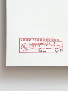 a red stamp is on top of a white piece of paper that says authentic dodgeburn product