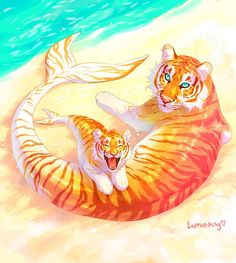 two tigers laying on top of each other in the sand