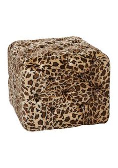 an animal print square ottoman cover on a white background