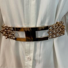 Beige Pu Leather Gold Tone Buckle Chained Elastic Waistband Belt Material: 50% Polyurethane, 50% Elastic Please Notice: White Shirt Is Not Included, Listing Is For The Belt Only. Warning: P65 (See Last Picture) All Measurements Are Approximate And Taken Laying Flat: Length: 29 1/2 Inches Width: 2 Inches Tags For Exposure: Chain Belt Chained Belt Western Boho Bohemian Western Wide Wide Belt Location: Tote: #2 Elegant Party Belt With Chain Strap, Elegant Party Belt With Chain Detail, Adjustable Metal Party Belt, Chic Metal Chain Belt For Summer, Elegant Metal Chain Belt, Trendy Gold Belts For Spring, Chic Gold-tone Chain Belt For Party, Chic Party Belt With Gold Buckle, Elegant Adjustable Chain Belt For Summer