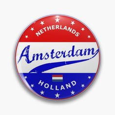 a red, white and blue button with the word holland on it's side