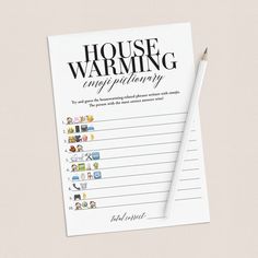 a notepad with the words house warming on it and a pencil resting next to it