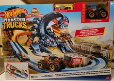 the hot wheels monster trucks playset is in its box with instructions to build it