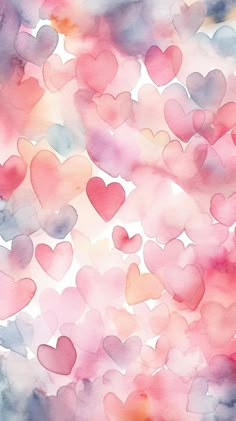 watercolor hearts are arranged in the shape of heart shapes on a pink and blue background