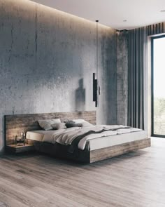 a modern bedroom with concrete walls and wood flooring, along with a white rug on the floor