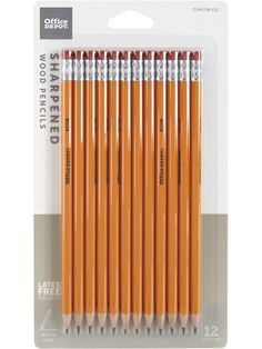 orange colored pencils in packaging with white writing on the front and back side of them