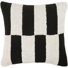 a black and white striped pillow on a white background