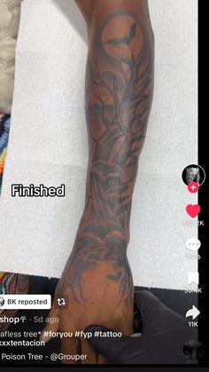 a person with tattoos on their arm and leg