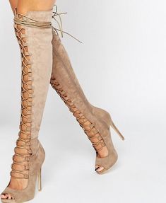 These gladiator-inspired suede thigh-high boots are simply gorgeous. Featuring an approximate 4" heel and a lace-up front falling just above the knee; these boots are the perfect item to make your look "Pop". Come in 2 fab colors. Lace Thigh High Boots, Knee High Sandals, Long Black Boots, Knee High Boots Winter, Peep Toe Boots, Buy Boots, High Sandals, Thigh Boot, Stiletto Boots