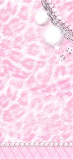 a pink background with pearls and beads