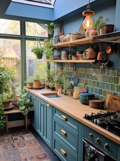 5 Ways To Make Your Kitchen More Witchy | witchy kitchen decor, witch kitchen, witchy home, witchy decor Green And Blue House Interior, Dark Blue And Green Kitchen, Nature Kitchen Ideas, Green And Blue Kitchen Ideas, Blue And Green Kitchen Decor Ideas, Blue Green Apartment, Blue And Green Interior Design, Blue Kitchen Aesthetic, Maximalism Kitchen