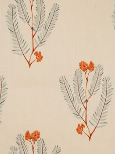 an orange and blue floral pattern on a white background with small brown flowers in the center