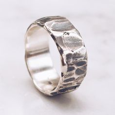 A textured Band Ring in 925 Sterling Silver with a unique raw textured and hammered finish. A stylish piece for both men and women. Available in Brass https://etsy.me/2U8LIgT Ring Size Available in all sizes. Please be sure to find your exact ring size for the finger you want before ordering. See image chart above or you can use the chart on my website as a guide - https://jewelrylab.co/pages/ring-sizing-tips Every piece is handcrafted in Bali and made with Intention, Love, and Soul so that it c Men Ring Ideas, Pirate Rings, Silver Ring Making, Cartier Crash, Ring Ding Dong, Silver Snake Bracelet, Unique Promise Rings, Mens Silver Jewelry, Silver Ring Designs