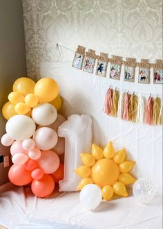 balloons and decorations on a table in a room